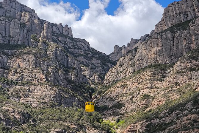 Montserrat Tour by Train with Cable Car and Cogwheel - The cable car and the ride back to Barcelona