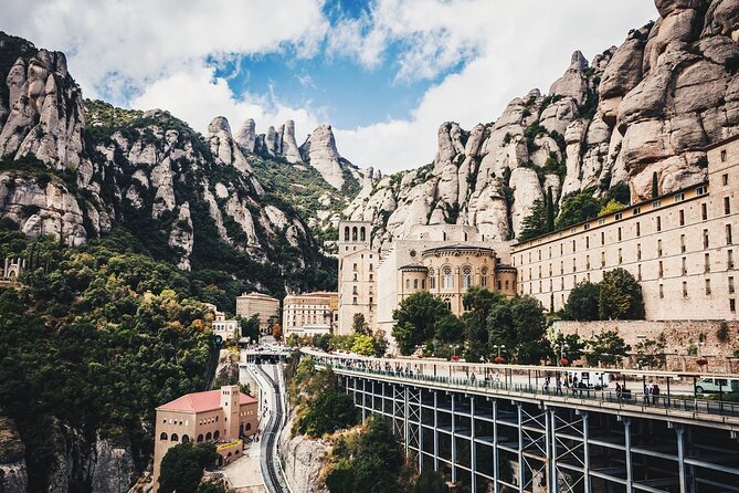 Montserrat with Cog-Wheel Train & Black Madonna Priority Access - The basilica and the story of La Moreneta