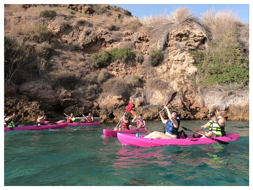 Nerja: Cliffs of Maro-Cerro Gordo Guided Kayak Tour - Paddling beneath the watchtower