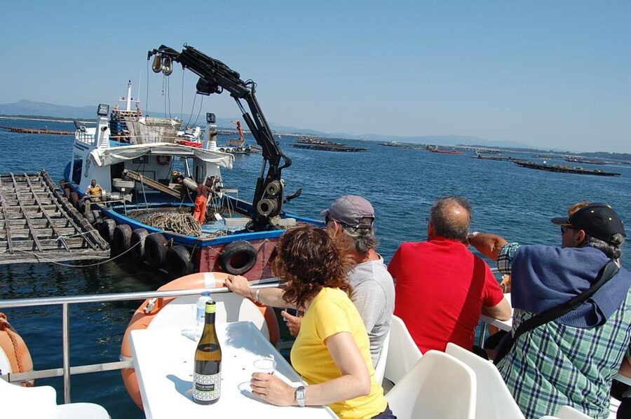 O Grove: Boat Tour at the Arousa estuary with mussel tasting - Unlimited mussels, wine, and a lively onboard mood