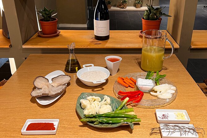 Paella Cooking Class, Wine Tasting & Central Market in Valencia - Price, duration, and group size