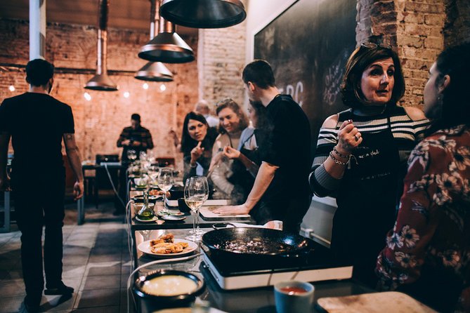 Paella Cooking Class with Professional Chef: Four Course Dinner - Entering The Paella Club in El Raval
