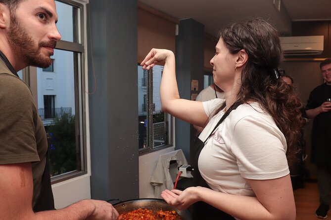 Paella Workshop with Bottomless Sangria in Central Madrid - Sharing the traditional paella pan