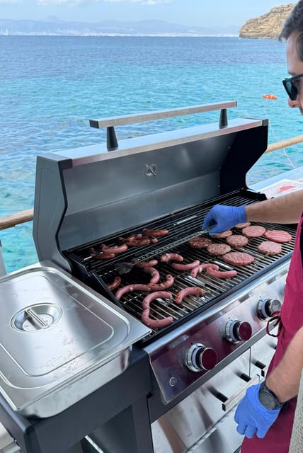 Palma Bay: Boat Tour with BBQ, Snorkelling, & Sunset Option - Cruising out from Can Pastilla