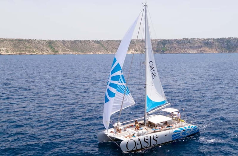 Palma de Mallorca: Deluxe Catamaran Sailing Tour with Meal - Leaving Palma and settling into the cruise