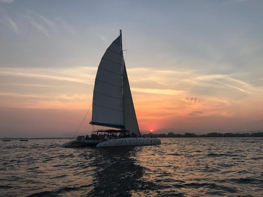 Palma de Mallorca: Sunset Sailing Catamaran Trip with Drink - The cathedral view from the water