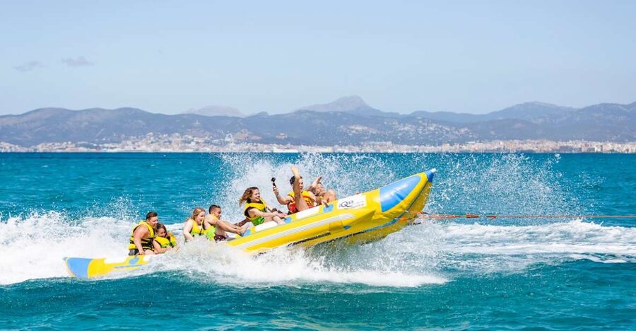 Playa de Palma: Banana Boat Ride - Holding On With Friends and Family