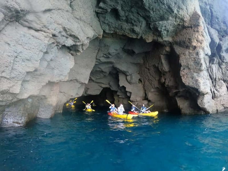 Puerto Mogán: Guided Adventure Kayak Tour in Caves & Snorkel - Paddling the four-kilometer volcanic coast