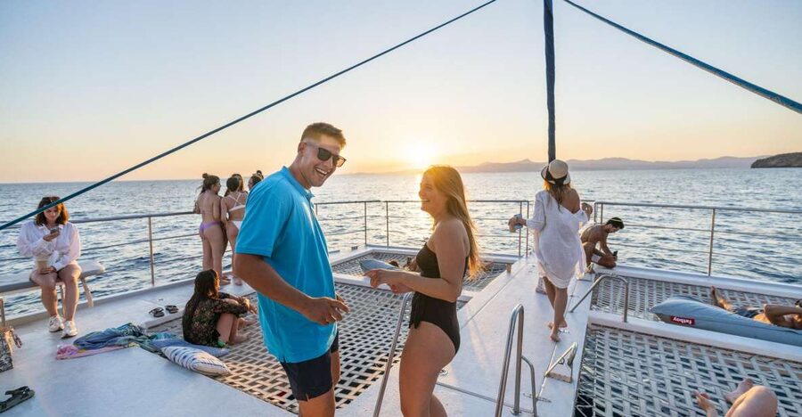 S'Arenal: Sunset Catamaran Cruise with BBQ - Leaving Playa de Palma for Palma Bay