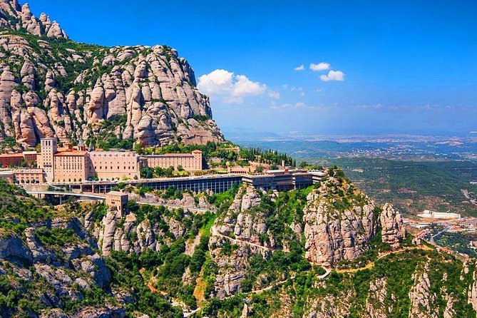 Sagrada Familia & Montserrat Small Group Tour with Hotel pick-up - Montjuïc opens the day with city views