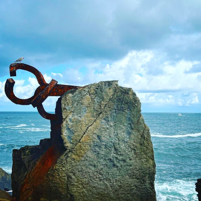 San Sebastian: Sustainable Catamaran Cruise with Audio Guide - Santa Clara Island and the coastal hills