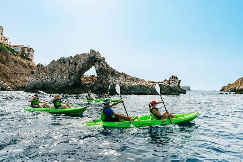 Santa Ponsa: Marine Reserve Kayak Tour - Caves, a small beach, and a natural pool