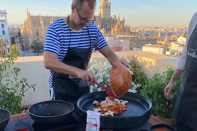 Sevilla: Rooftop Paella Cooking Class & 30-minute expert Q&A - Learning the original chicken and vegetable paella