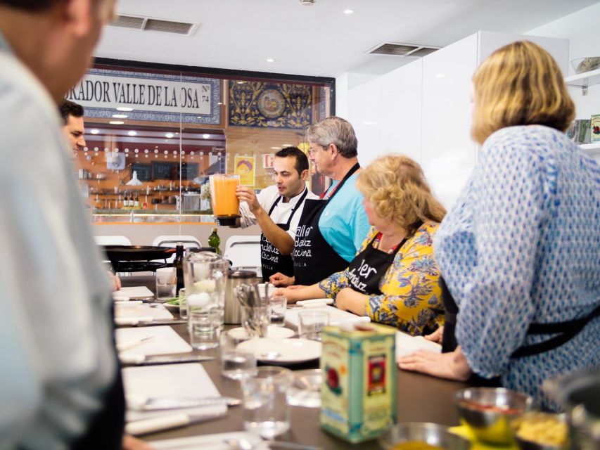 Seville: 3.5-Hour Spanish Cooking Class & Triana Market Tour - A light dessert and a table full of food