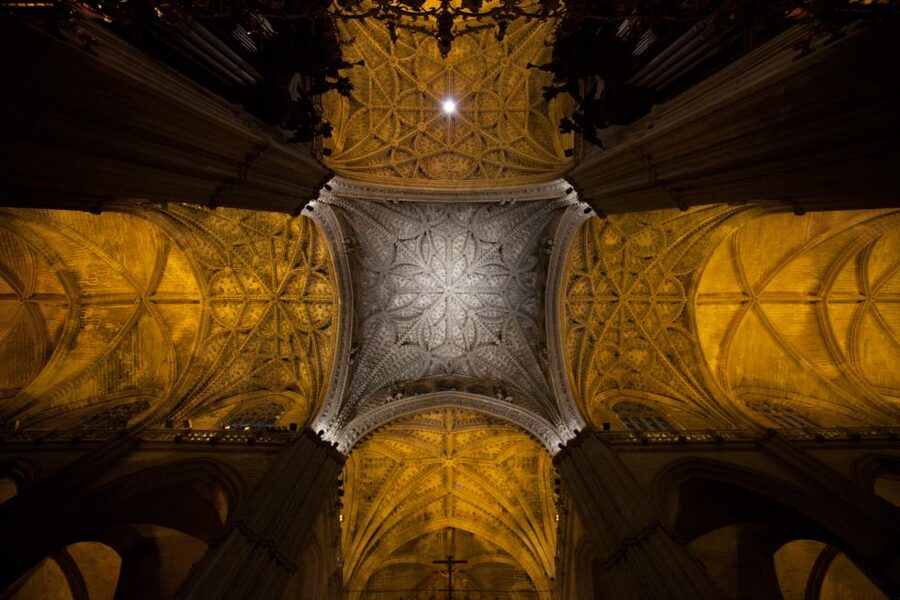Seville Cathedral and Giralda Tower Guided Tour and Tickets - Paintings, windows, and the tomb of Columbus