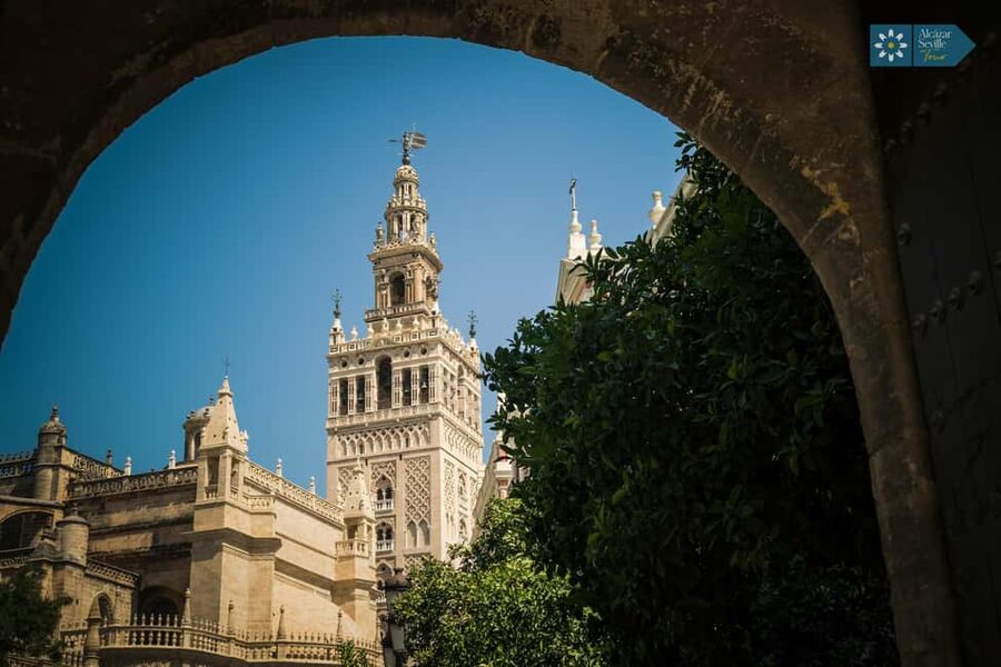 Seville: Cathedral, Giralda, and Royal Alcázar Guided Tour - Climbing the Giralda on broad, unusual ramps