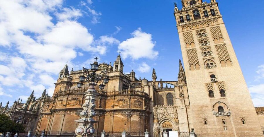 Seville: Cathedral & Giralda Guided Tour with Entry Tickets - Entering the former mosque turned cathedral