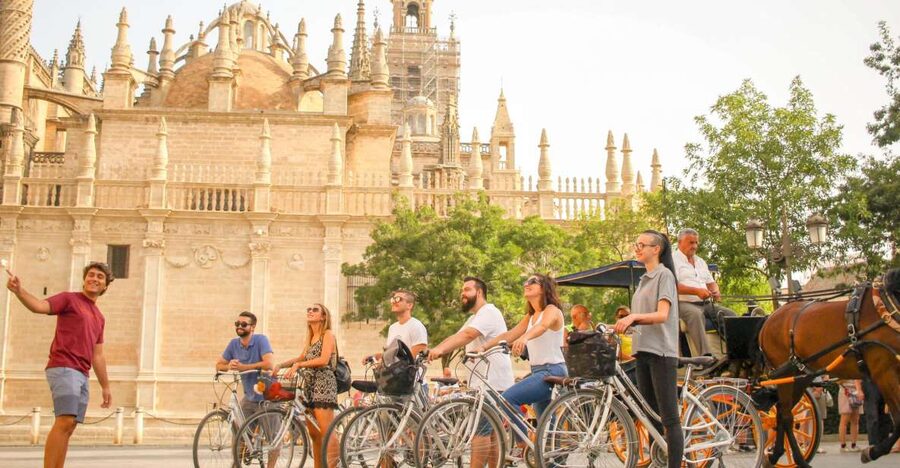 Seville: City Sightseeing and Local Culture Bike Tour - Starting inside Mercado del Arenal