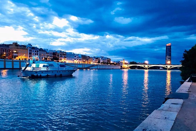 Seville: Cruise along the Guadalquivir River with appetizer - Bridges, Triana, and the Expo 92 area