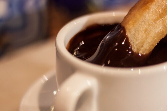 Seville Food Tour: Vermut, Churros & 10+ Tasty Local Dishes - Crossing the river into Triana