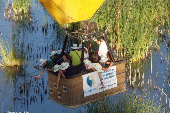 Seville Hot-Air Balloon Ride with Breakfast, Cava & Hotel Pick up - Floating above pine woods, rivers, and fields