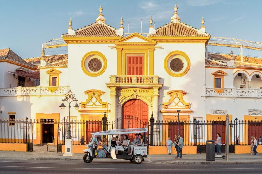 Seville: Private City Tour by Eco Tuk Tuk - San Telmo Palace and the old tobacco factory