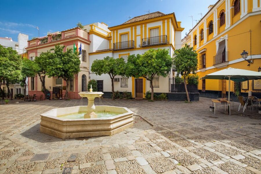 Seville: Relaxing City Bike Tour with a Tour Guide - Orange Trees in the Jardines de Murillo