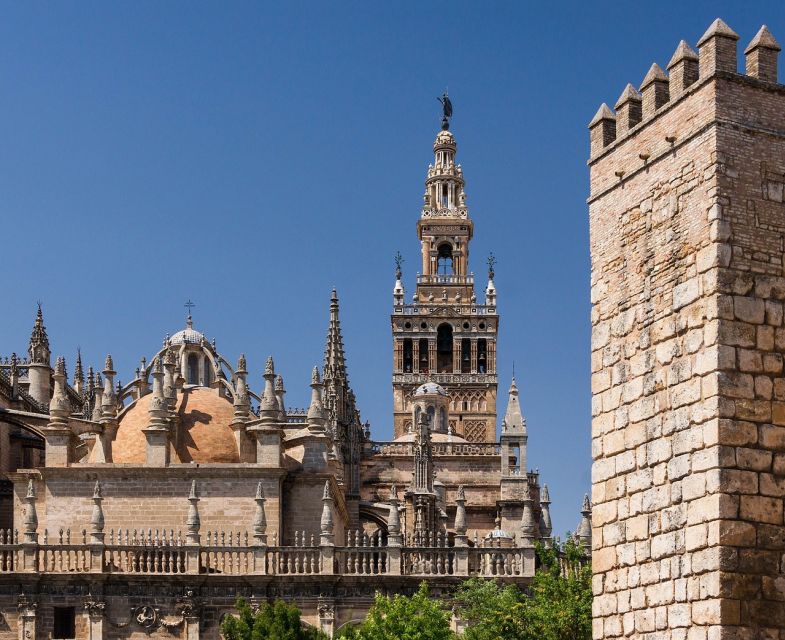 Seville: Small-Group City Highlights Walking Tour - María Luisa Park on the way to Plaza de España