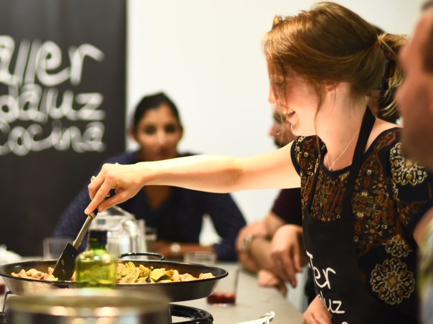 Seville: Spanish Cooking Class with Dinner - Making chicken paella with seasonal vegetables