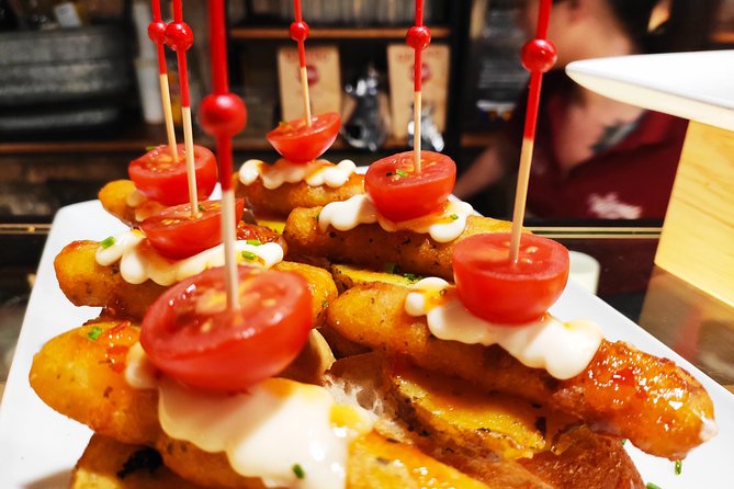 Spanish Wine and Tapas Tour in a Local Neighborhood in Barcelona - Meeting near Avinguda del Paral·lel 115