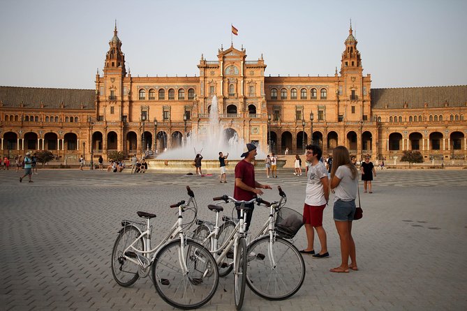 Sunset Guided Bike Tour in Seville - The Alcázar exterior and Torre del Oro