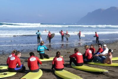 Surf class in Famara 9:15-12:00 or 11:45-14:30 (2h class)