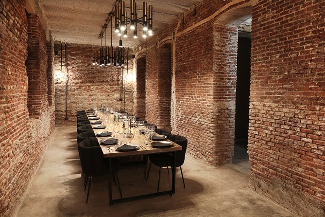 Taste of Spain: Tapas Cooking Class with Bottomless Wine Pairing - From the kitchen to the brick dining room