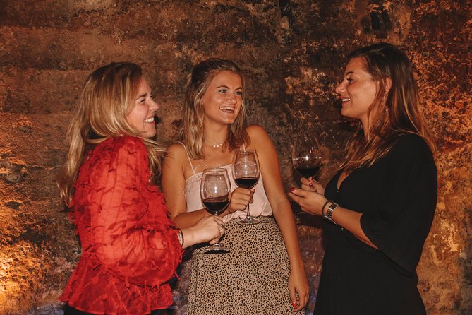 Valencia Old Town Tour with Wine & Tapas in 11th Century Historic Monument - Plazas, cathedral views, and civil Gothic details