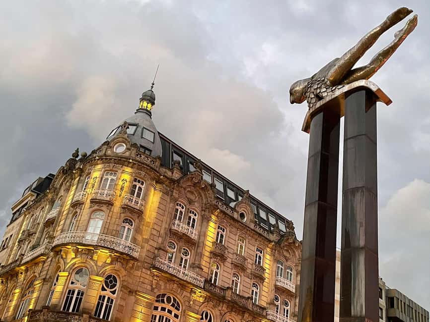 Vigo: Walking Tour with local History & Culture - Starting beneath Vigo’s O Sireno sculpture