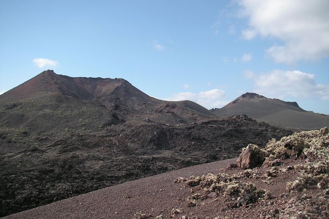 Volcano Hike - Timanfaya eruptions - Craters, lava flows, and the shape of the island